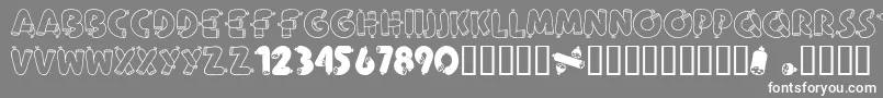 フォントAlphaSausage – 灰色の背景に白い文字