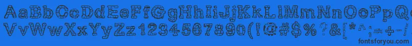 RhBrickhausProtoVertebra Font – Black Fonts on Blue Background