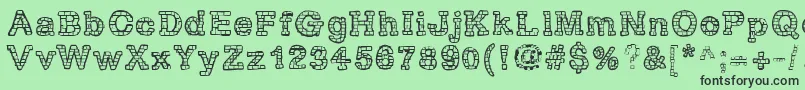 RhBrickhausProtoVertebra Font – Black Fonts on Green Background