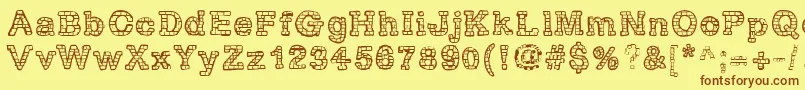 RhBrickhausProtoVertebra Font – Brown Fonts on Yellow Background