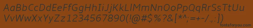 Amble Lightitalic Font – Black Fonts on Brown Background