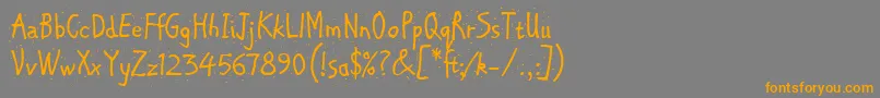 フォントChipperLetPlain.1.0 – オレンジの文字は灰色の背景にあります。