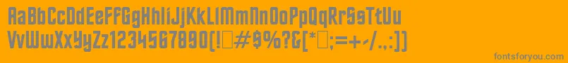 Oldtrek-fontti – harmaat kirjasimet oranssilla taustalla