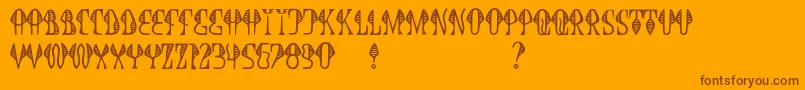 JmhCobra-Schriftart – Braune Schriften auf orangefarbenem Hintergrund