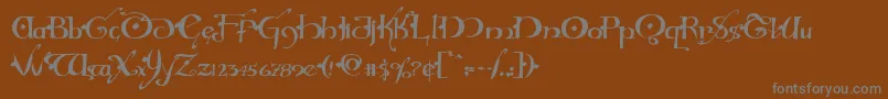 フォントHollyjinglesolid – 茶色の背景に灰色の文字