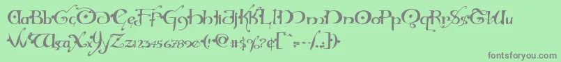 フォントHollyjinglesolid – 緑の背景に灰色の文字