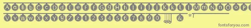 フォントPartyTime – 黄色の背景に灰色の文字