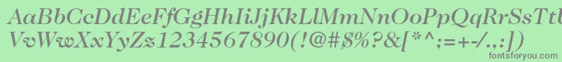 Fonte Caslon224stdMediumitalic – fontes cinzas em um fundo verde