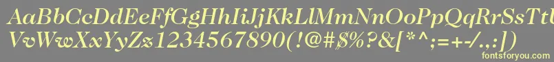 Caslon224stdMediumitalic-fontti – keltaiset fontit harmaalla taustalla