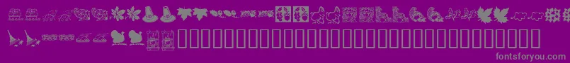 KrHarvestDings-fontti – harmaat kirjasimet violetilla taustalla