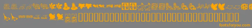 フォントKrHarvestDings – オレンジの文字は灰色の背景にあります。