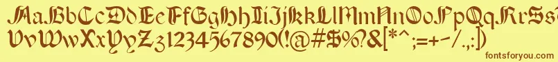 フォントBoeretudor – 茶色の文字が黄色の背景にあります。