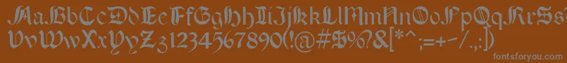 Boeretudor-Schriftart – Graue Schriften auf braunem Hintergrund