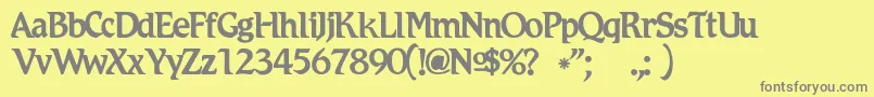 Romicc-Schriftart – Graue Schriften auf gelbem Hintergrund