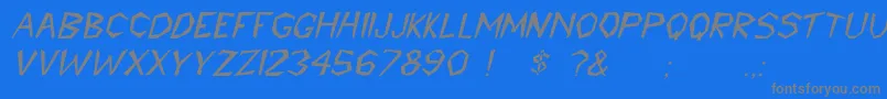 Czcionka CavemannItalic – szare czcionki na niebieskim tle