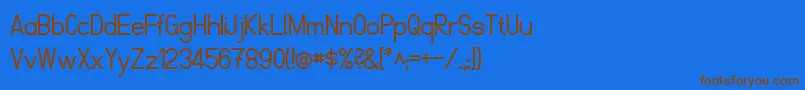 フォントFibelNord – 茶色の文字が青い背景にあります。