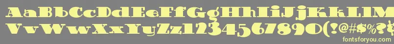 Guinnessextrastoutnf Font – Yellow Fonts on Gray Background