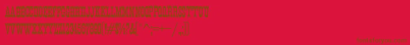 K22EurekaNofrills Font – Brown Fonts on Red Background