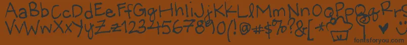 LittleMissWonderful Font – Black Fonts on Brown Background