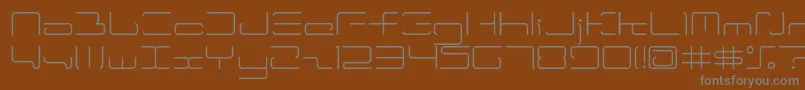 Fonte Ltr04 – fontes cinzas em um fundo marrom