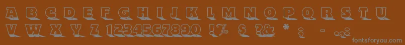 Шрифт Toyland ffy – серые шрифты на коричневом фоне