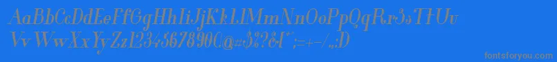 フォントGlamorBoldCondensedItalic – 青い背景に灰色の文字