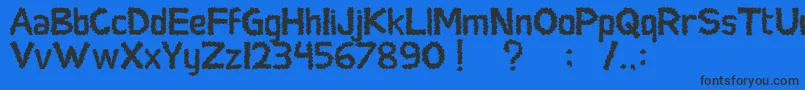 SocialMonster Font – Black Fonts on Blue Background