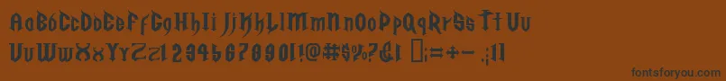 フォントGolgrge – 黒い文字が茶色の背景にあります