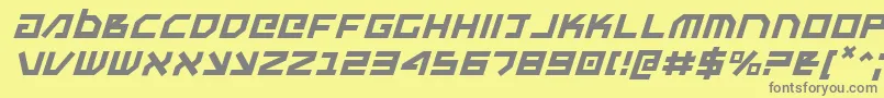 フォントUnoestadoi – 黄色の背景に灰色の文字