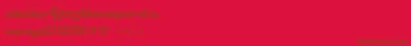 Czcionka Greaturedemo – brązowe czcionki na czerwonym tle