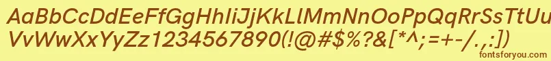 フォントHkgroteskSemibolditalic – 茶色の文字が黄色の背景にあります。