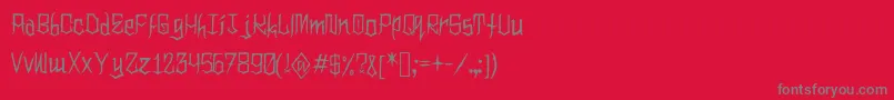 フォントClownoween – 赤い背景に灰色の文字