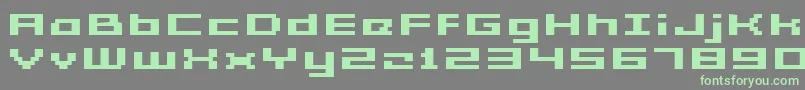 Fonte GrixelAcme5WideBoldXtnd – fontes verdes em um fundo cinza