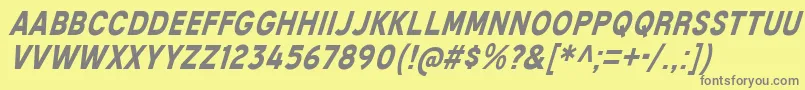 MixolydianTitlingBdIt-fontti – harmaat kirjasimet keltaisella taustalla