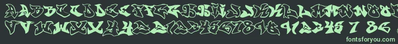 Шрифт Graffonti.Atomic.Bomb.Fontvir.Us – зелёные шрифты на чёрном фоне