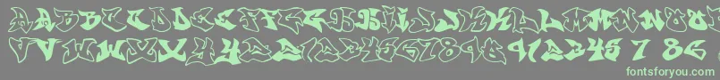 Шрифт Graffonti.Atomic.Bomb.Fontvir.Us – зелёные шрифты на сером фоне