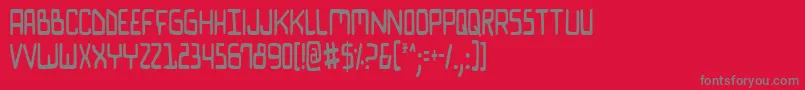 Czcionka BionicComicCondensed – szare czcionki na czerwonym tle