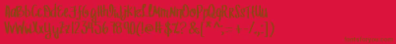 Шрифт MrfLetFreedomRing – коричневые шрифты на красном фоне