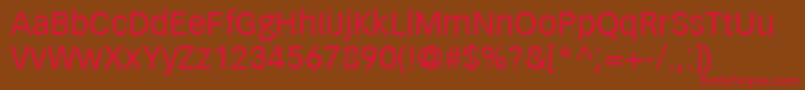 Fonte VectoraLt55Roman – fontes vermelhas em um fundo marrom