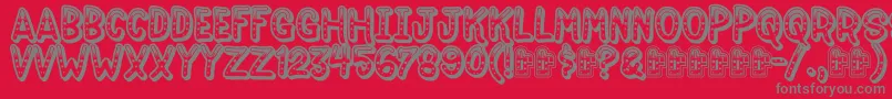 Jokewood Font – Gray Fonts on Red Background