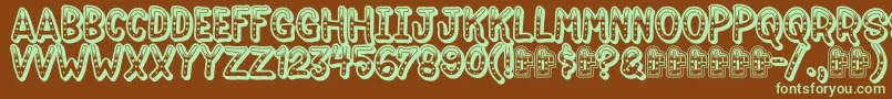 Jokewood-fontti – vihreät fontit ruskealla taustalla