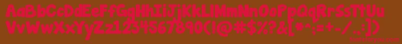 Jandamanateesolid Font – Red Fonts on Brown Background