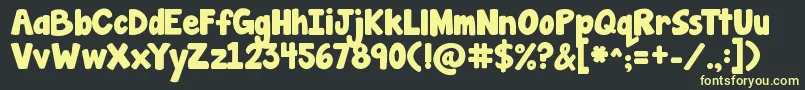 Jandamanateesolid Font – Yellow Fonts on Black Background