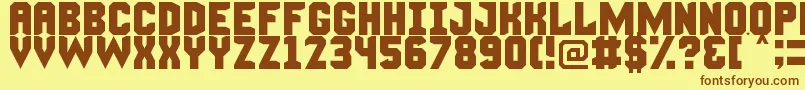 Fonte ManlyManFont – fontes marrons em um fundo amarelo