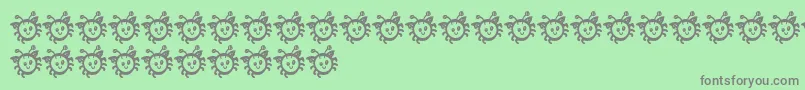 BmdCuddleBug Font – Gray Fonts on Green Background