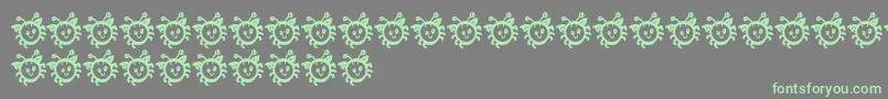 BmdCuddleBug Font – Green Fonts on Gray Background