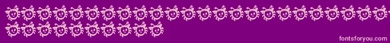 BmdCuddleBug-Schriftart – Rosa Schriften auf violettem Hintergrund