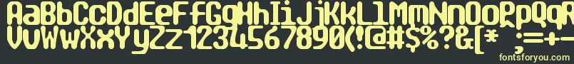 TragicBrk Font – Yellow Fonts on Black Background