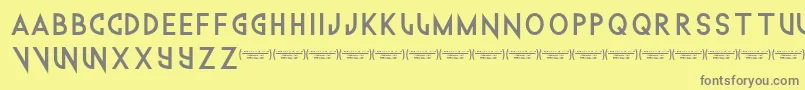 Technowanker Font – Gray Fonts on Yellow Background