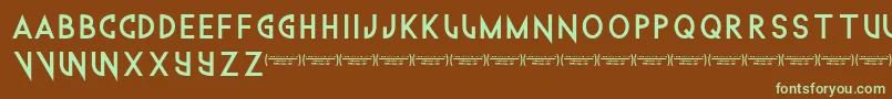 フォントTechnowanker – 緑色の文字が茶色の背景にあります。